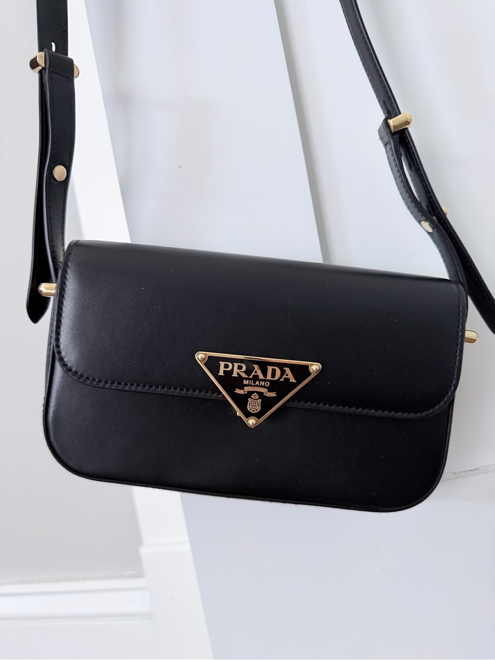 Prada Black Leather Crossbody with Gold Triangle Logo Plate